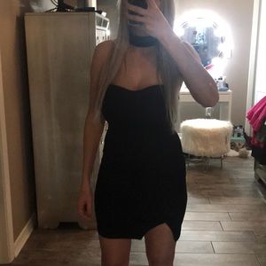 Black dress tube goes around neck